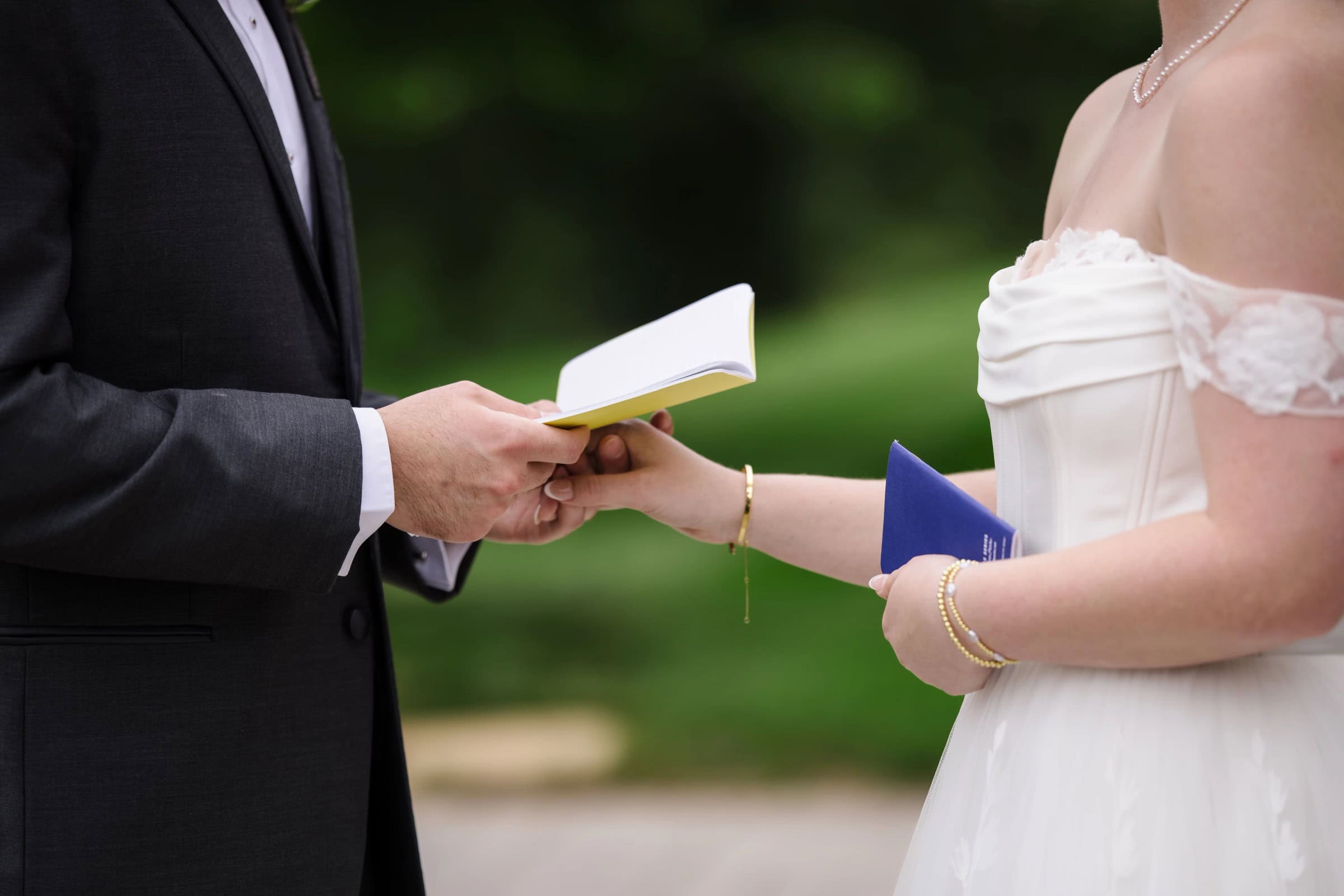 Bride and groom exchanging vows and rings during the wedding ceremony. — Wedding at Glasbern Inn, Fogelsville, PA