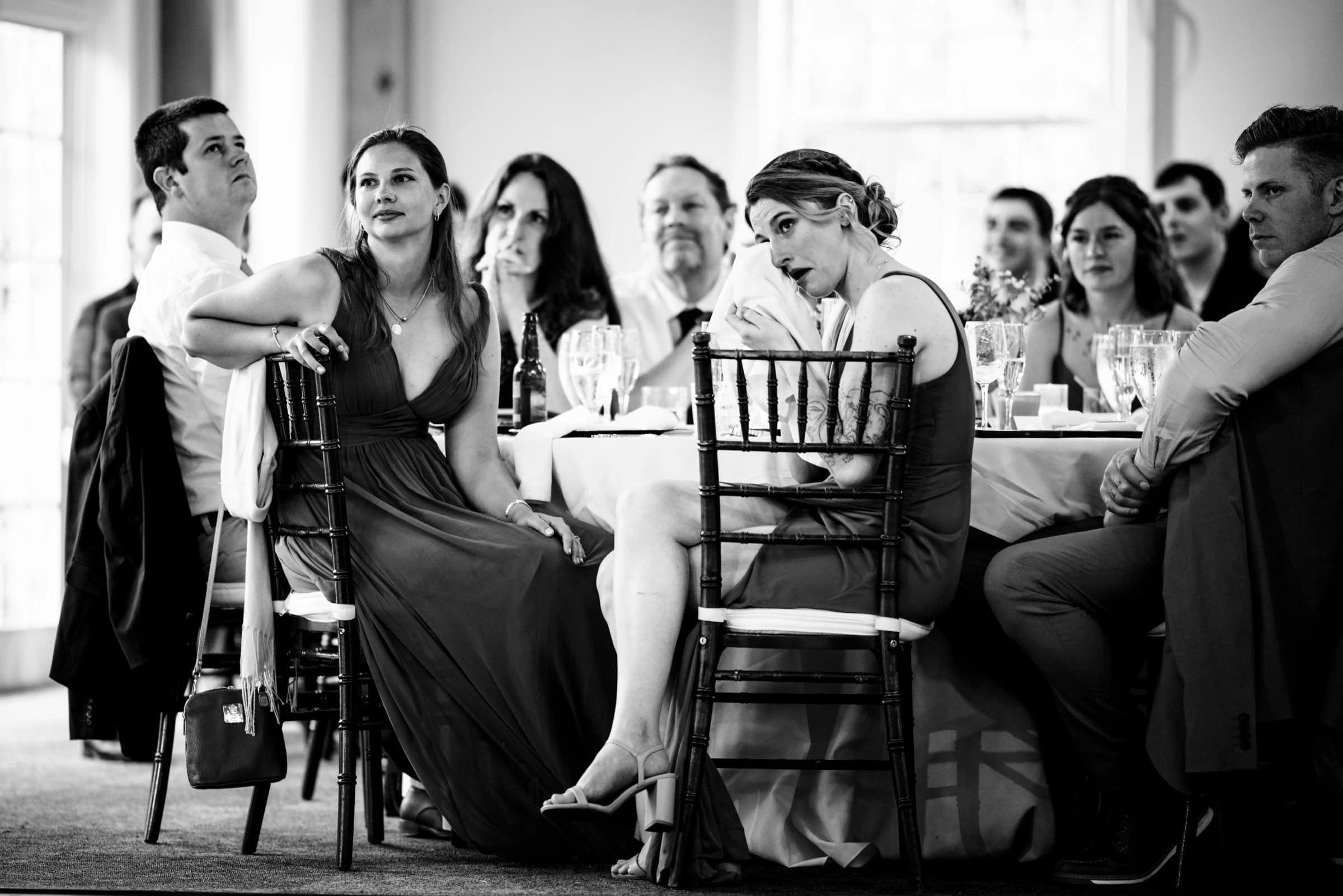 Wedding guests seated at a table, laughing and engaged in conversation during the reception. — Wedding at Glasbern Inn, Fogelsville, PA