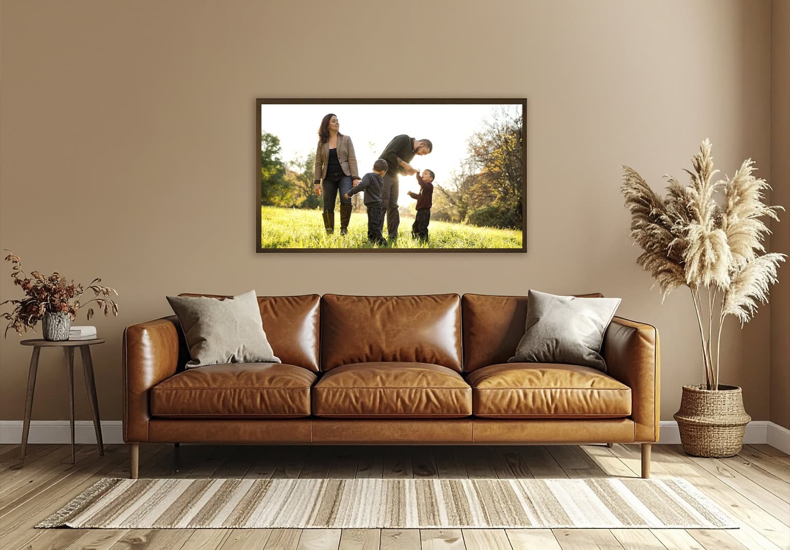 Framed artwork of a family hanging above a couch